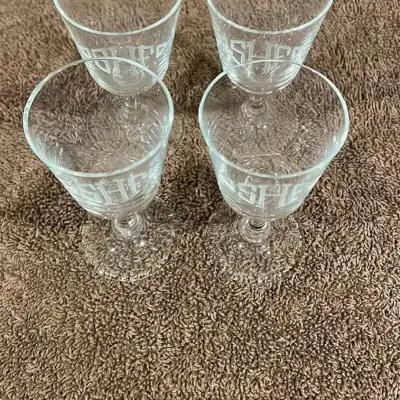 Crystal liqueur glasses set of Four 3 1/4 inches tall 1 3/4 inches in diameter They were a wedding g...