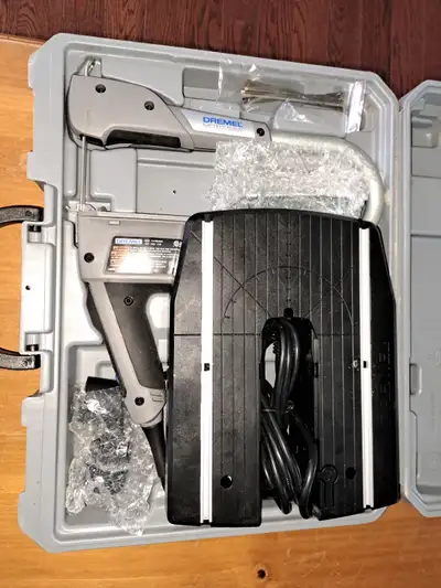 Dremel moto saw portable scroll saw.  New., View more