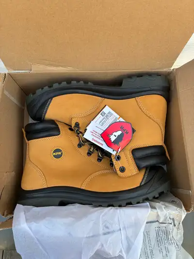 Insulated KPR King Power work boots. Boots are tan with black soles and black padded collars. Has 3M...