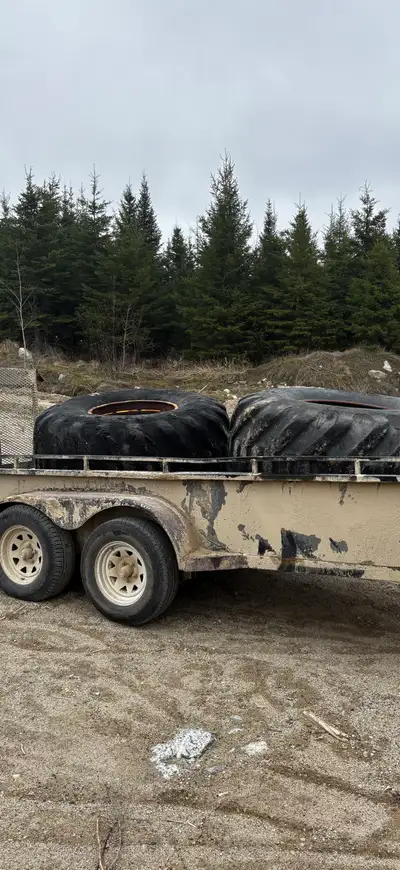 750/26.5/55 $2500 each mounted on JD rims