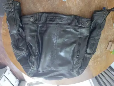 Dainese leather pants with armour in hips and knee/ shin in good condition $100. Also a Held jacket...