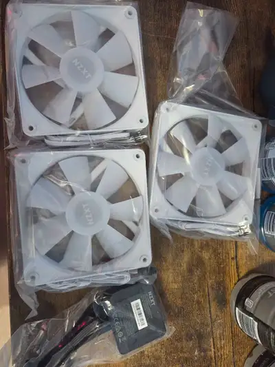 Selling a set of three NZXT RGB fans, complete with their controller. These fans are in excellent co...