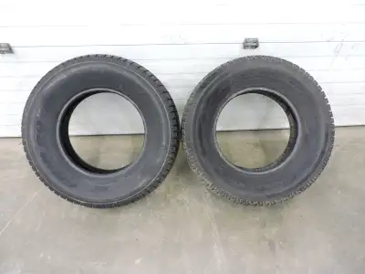 A pair of Antares Grip 20 snow tires that are P245/70R16 size, date codes are 30/22 and they both ha...