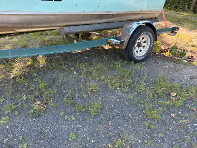 3500 lb single axel boat trailer Fit up to 18 foot boat. Needs new fenders and wiring. Tires, couple...