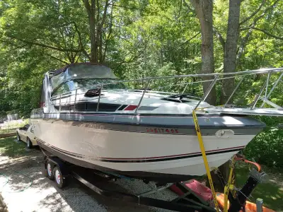 Nice cruiser in good condition. Comes with bunk tandem trailer with electric brakes, newer tires, ho...