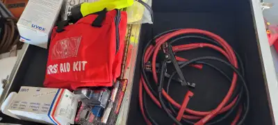 This is a road side Emergency Kit in an Aluminum Suitcase Aluminum Case External Dimension 22” x 14”...