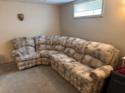 Sectional couch, one recline, hide a bed With mattress. Has one tear in one cushion, Clean.