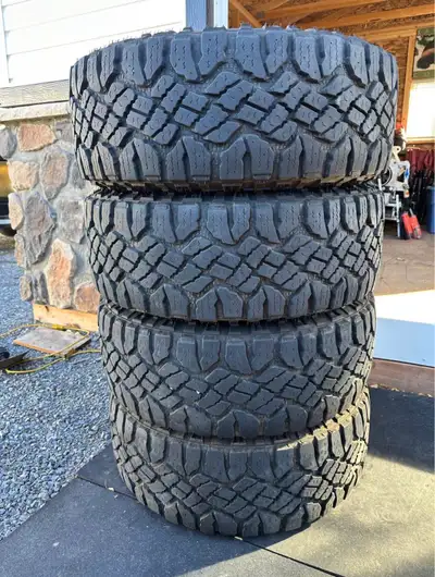 Used 2 summers, upgraded tire size Price Ono