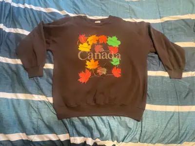 Selling my vintage late 1980s early 1990s Canada Crewneck sweater. The sweater is in good condition...