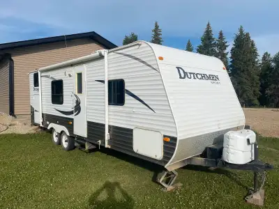 2010 Dutchmen 27ft bumper pull for sale. Everything works a/c, fridge, hot water tank. No leaks. Tir...