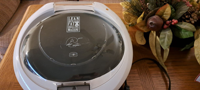 George forman Lean Mean Grilling Machine in Microwaves & Cookers in Barrie