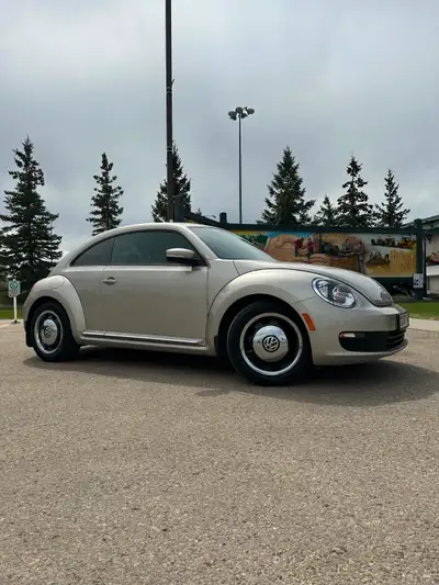 This is the most well taken care of vehicle I have EVER seen traded into a dealership. The 2015 Beet...