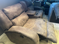 Double reclining sofa with centre console. 