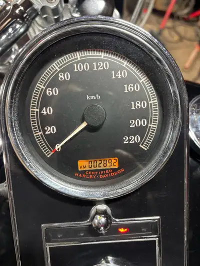 2005 Softail Deluxe.. 2800 Kms!! Still a bran new bike some rust on wheels from storage. Has reverse...