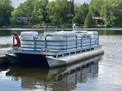 20 foot Manitou early 90s with a 40 Mercury 2 stroke motor, the pontoons are in great shape but the...