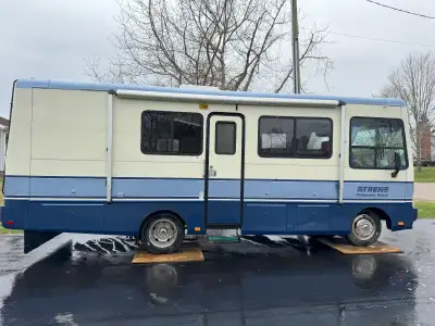 1997 Trek Safari Pathmaker Class A motorhome Highlights: This is a collector motorhome with wood int...