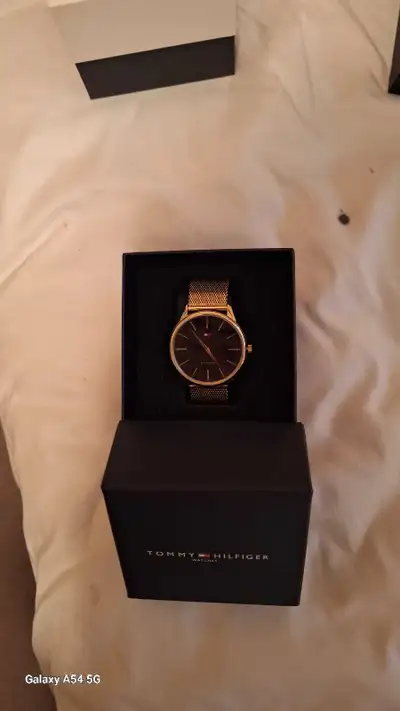 Tommy Hilfilger ( by Movado company, View more