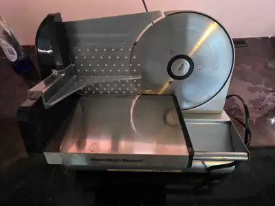 I'm selling a used Hamilton Beach meat slicer, perfect for slicing meats and cheeses at home. It is...