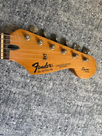 This is a pretty rare made in Mexico, 1994–5 Fender Stratocaster Squire Series guitar. Plays well, s...