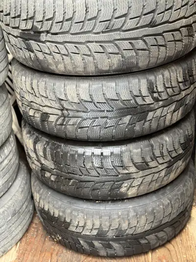 255/55/R20. These have been driven on 1 winter. Three aluminum rims come with them. (4, but one is c...