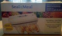 Vacuum Food Sealer "Seal a Meal" Working