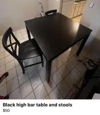 Black high table with 2 bar stools ( chair style) 