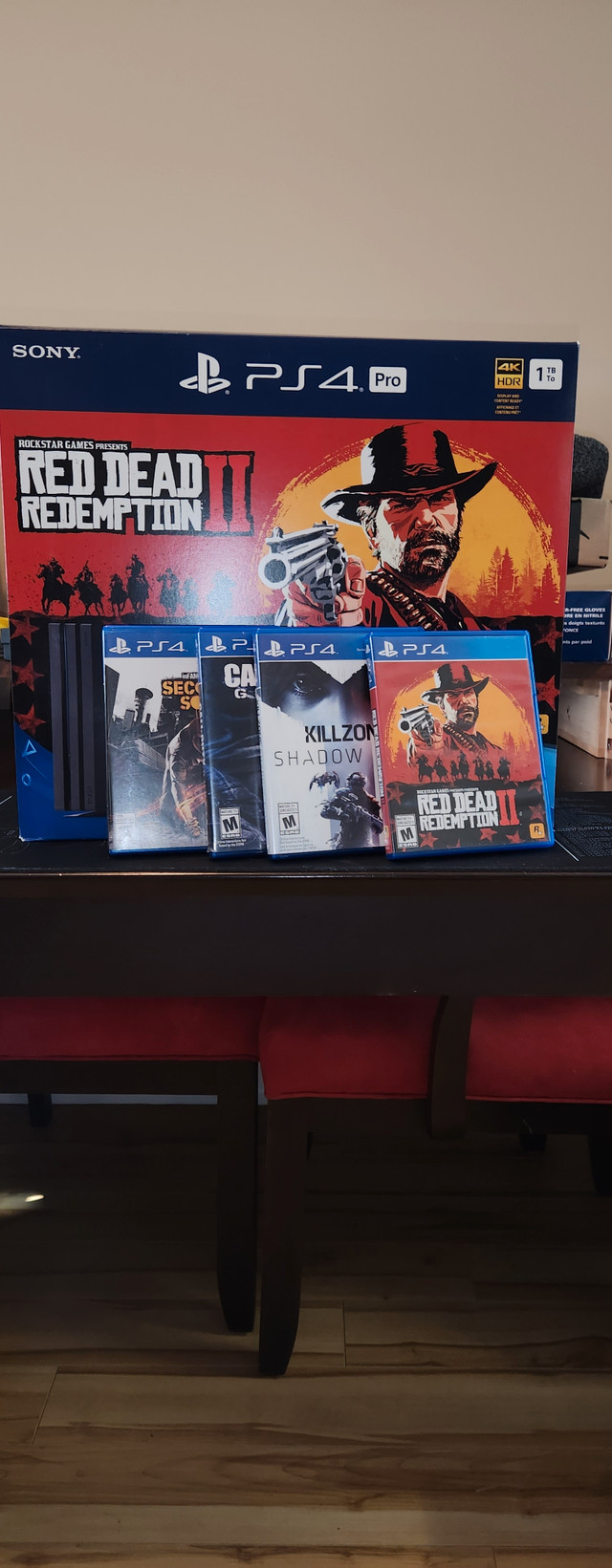 PS4 Pro 1 TB Red Dead 2 bundle original box near mint in Sony Playstation 4 in Oshawa / Durham Region