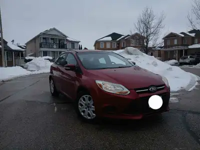 Selling 2013 Ford Focus Hatchback with Safety — a beautiful car in classic red exterior a matching b...