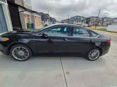 2013 Ford fusion S.E Fully loaded with all the options, auto starter and winter tires.