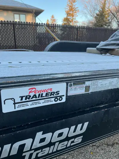 2022 Rainbow Tilt-deck trailer. Two 5200 lb. axles. In excellent condition. Can include E-TRAC, batt...