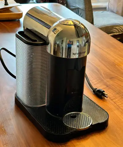 This used Nespresso VertuoLine coffee machine is in great working condition and brews delicious coff...