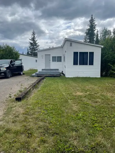 Located in a quiet family setting trailer park. only 3 1/2 km from Burns Lake. Bus stop for children...