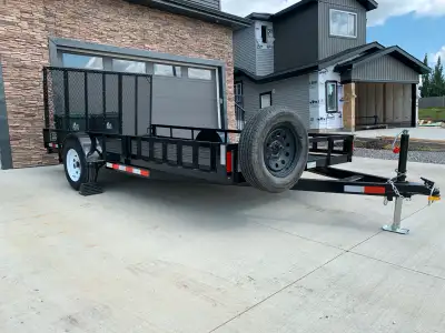 2021 utility / side x side trailer Nice condition. Back ramp and side ramp pull through. Dimensions...