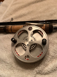 Angling specialties float reel & brand new sage rod