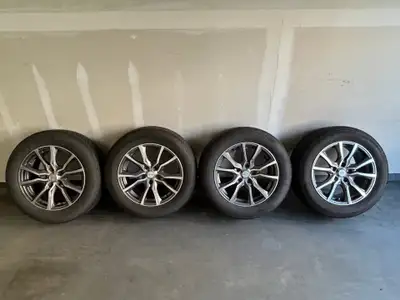 4 - Bridgestone Turanza Quiettrack tires ($1100 new) and Rims ($800 new) in like new condition, only...