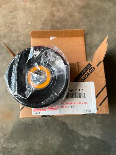 BRAND NEW Genuine Toyota Part # 166030W030 (16603-0W030) - Accessory Drive Belt Tensioner Pulley. Fi...