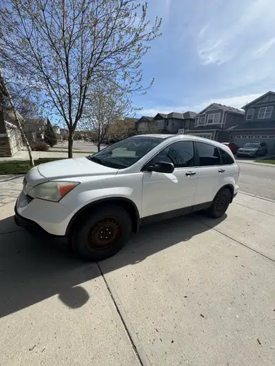 2009 Honda CR-V EX AWD - 2 Sets of Tires Reliability meets utility. This Honda CR-V has been a depen...
