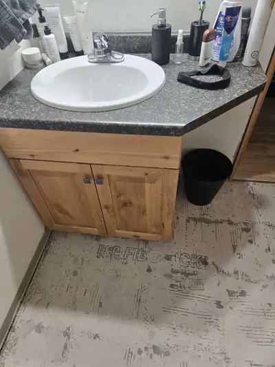 1 bathroom vanity. Sink and tap not included. $100 37" wide.