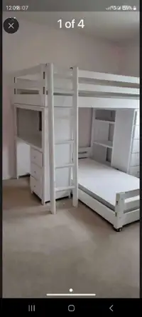 Bunk bed with desk table and book shelf