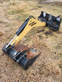 Mini hoe attachment for skidsteer
