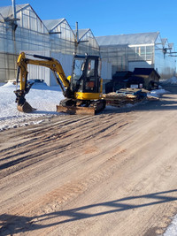 Excavator/dump trailer services 