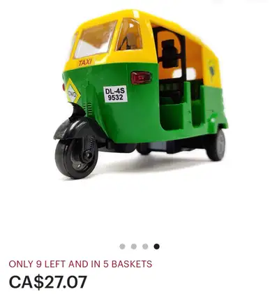 This is a new Tuk Tuk toy in its original packaging. It would make a great souvenir. This charming m...