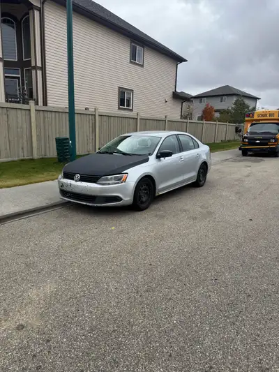 2012 Silver Volkswagen Jetta S, 2.0L 5-speed manual, recent oil change, all weather tires new in Jul...