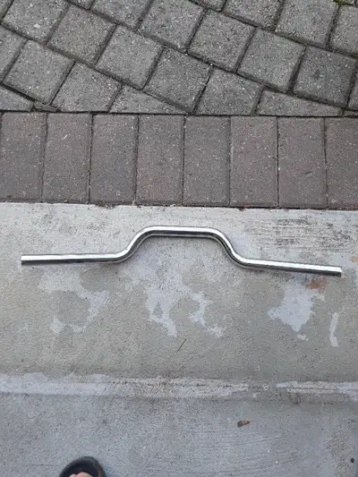 Handlebar is 22mm diameter, 59cm long, 4cm high and the centre part is 14cm long. Came off of a BMW...