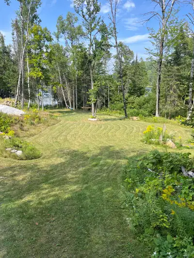 Wow. 2 acres of groomed waterfront property on Grande Lac du Cerf. 200ft of waterfront in quiet bay...