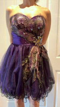 Amethyst designer grad/prom dress. Unique design with intricate