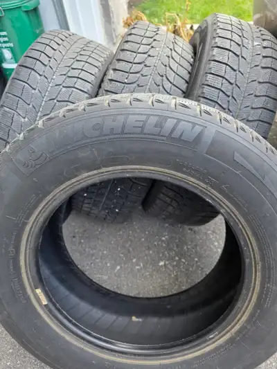 I HAVE 4 USED WINTER TIRES IN GOOD CONDITION 215-65-R16 MICHELIN X-ICE WITH OUT RIMS. PLEASE CALL ME...