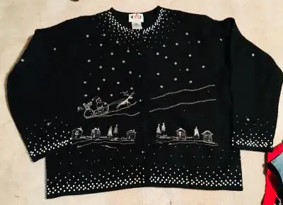 This is for a vintage Grandma’s ugly Christmas black button cardigan sweater. With Santa in sleigh a...