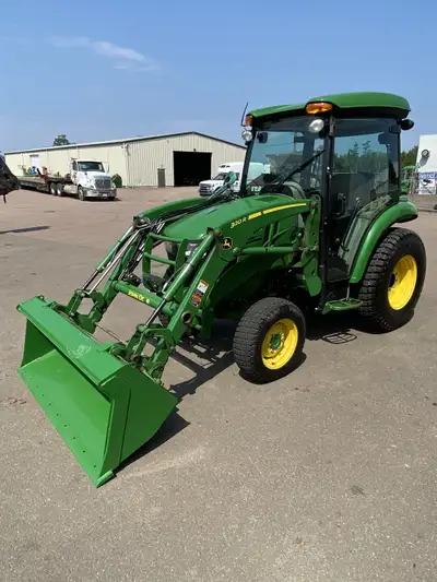 2021 John Deere 3039R compact utility tractor with a 320R Loader and HVAC cab. Some key features of...