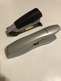 Staplers your  choice half of new. 